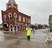 Police Officer Russell Grizzard working in the rain