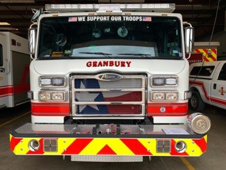 The front of a Granbury Volunteer Firetruck.